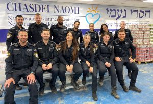Chasdei Naomi and police Officers
