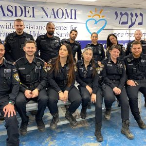 Chasdei Naomi and police Officers