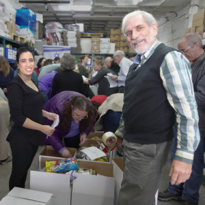 Yad Vashem team came to pack food baskets for those Holocaust survivors.