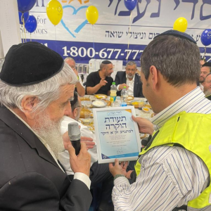ZAKA Volunteers receiving certificates