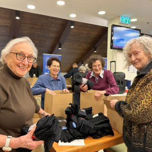 Holocaust Survivors in Israel Volunteered to assemble winter care packages for IDF Soldiers.