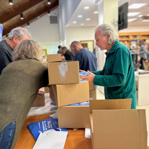 Holocaust Survivors in Israel Volunteered to assemble winter care packages for IDF Soldiers.