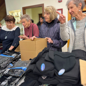 Holocaust Survivors in Israel Volunteered to assemble winter care packages for IDF Soldiers.