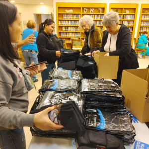 Holocaust Survivors in Israel Volunteered to assemble winter care packages for IDF Soldiers.