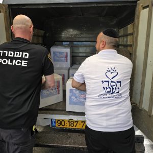 Volunteers pack food baskets for Rosh Hashanah