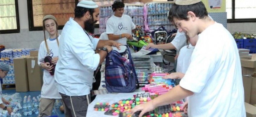 Thousands of School Bags and School Supply Kits Distributed by Chasdei Naomi