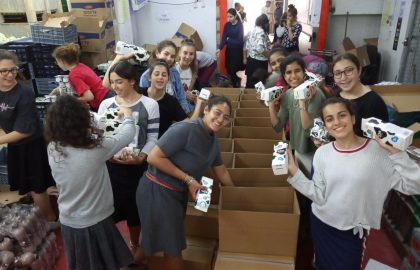 Distribution of Dairy Products for Shavuot for Holocaust Survivors